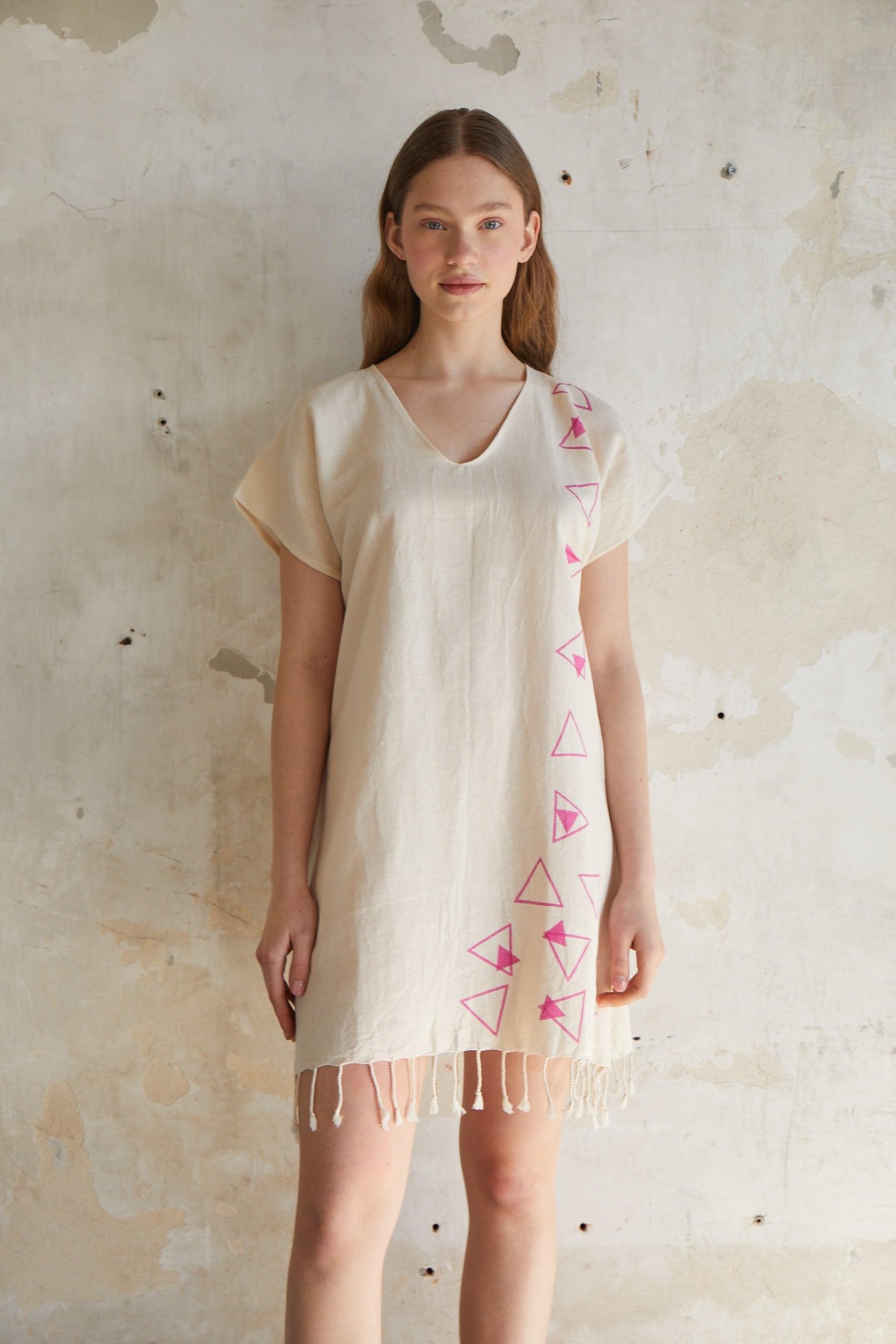 Pink geometric woodcut printed short sleeve mini beach dress with tassels hem in natural beige %100 organic cotton - trendynow