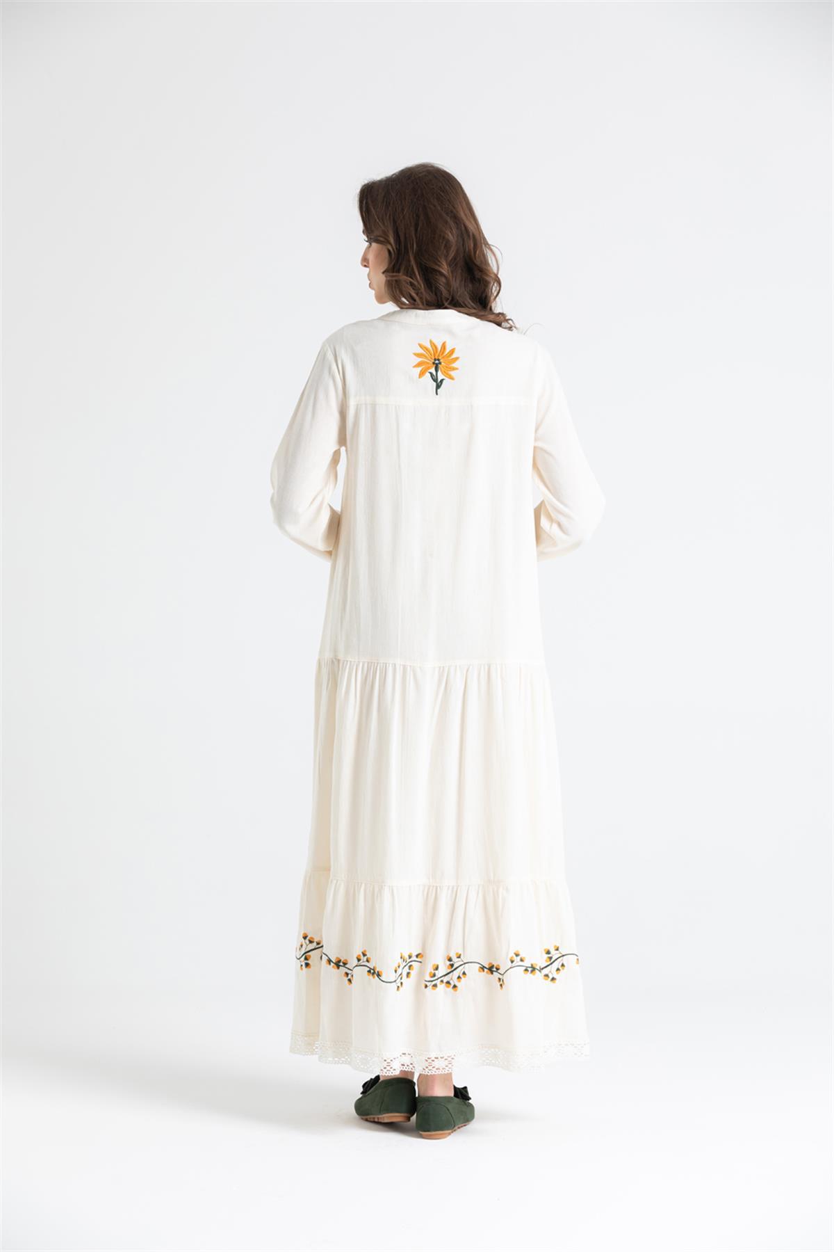Long-sleeved Sile Cloth Dress With Floral Embroidery And Guipure Lace Detail At The Hem - trendynow